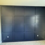 Dark blue paneled wall